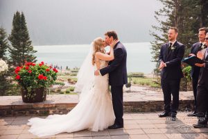 First Kiss, Husband and wife, newlyweds, outdoor wedding, Chateau Lake Louise Wedding, Real Wedding, Creative Weddings Planning & Design